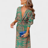 Vesna - Midi obleka z V-izrezom" can be rewritten as "Vesna - Midi Dress with V-Neck