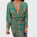 Vesna - Midi obleka z V-izrezom" can be rewritten as "Vesna - Midi Dress with V-Neck