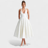 Julieta – Midi obleka s halter izrezom" could be rewritten as "Julieta – Midi obleka s halter vratnim izrezom.