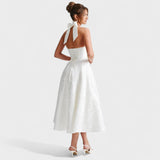 Julieta – Midi obleka s halter izrezom" could be rewritten as "Julieta – Midi obleka s halter vratnim izrezom.