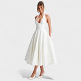 Julieta – Midi obleka s halter izrezom" could be rewritten as "Julieta – Midi obleka s halter vratnim izrezom.