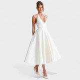 Julieta – Midi obleka s halter izrezom" could be rewritten as "Julieta – Midi obleka s halter vratnim izrezom.