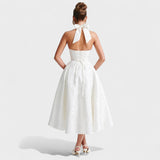 Julieta – Midi obleka s halter izrezom" could be rewritten as "Julieta – Midi obleka s halter vratnim izrezom.