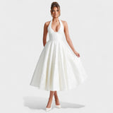 Julieta – Midi obleka s halter izrezom" could be rewritten as "Julieta – Midi obleka s halter vratnim izrezom.