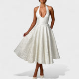 Julieta – Midi obleka s halter izrezom" could be rewritten as "Julieta – Midi obleka s halter vratnim izrezom.
