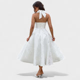 Julieta – Midi obleka s halter izrezom" could be rewritten as "Julieta – Midi obleka s halter vratnim izrezom.
