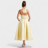 Julieta – Midi obleka s halter izrezom" could be rewritten as "Julieta – Midi obleka s halter vratnim izrezom.