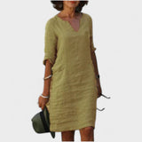 "Lana - Obleka z V-izrezom" could be rewritten as "Lana - V-Neck Dress".