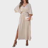 Cvita - Obleka z V-izrezom" can be rewritten as "Cvita - V-Neck Dress.