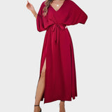 Cvita - Obleka z V-izrezom" can be rewritten as "Cvita - V-Neck Dress.