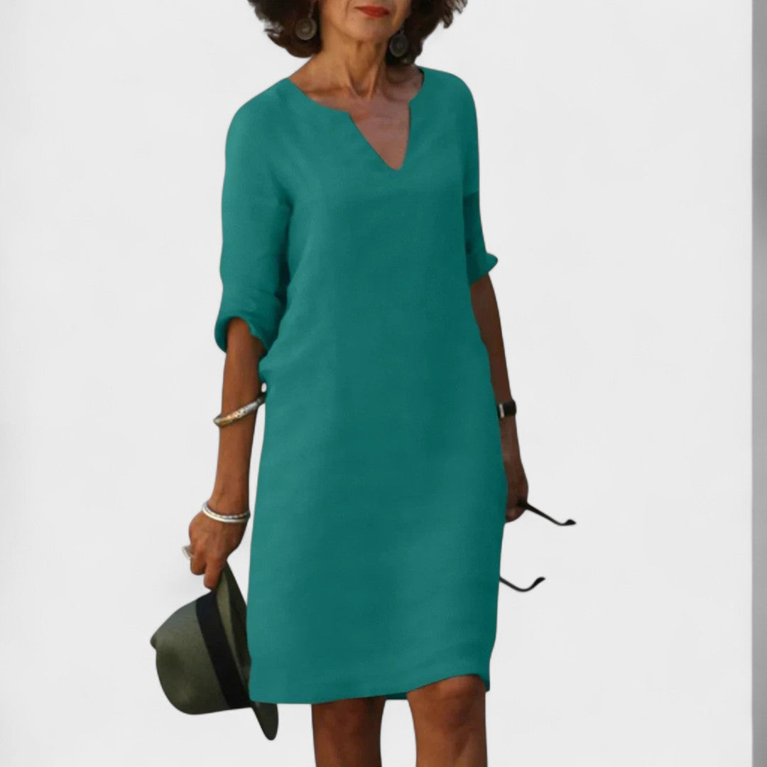 "Lana - Obleka z V-izrezom" could be rewritten as "Lana - V-Neck Dress".