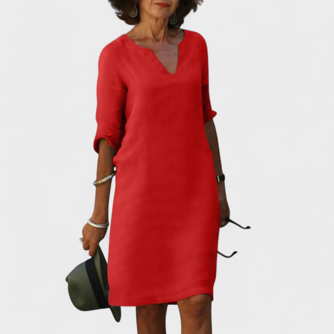 "Lana - Obleka z V-izrezom" could be rewritten as "Lana - V-Neck Dress".