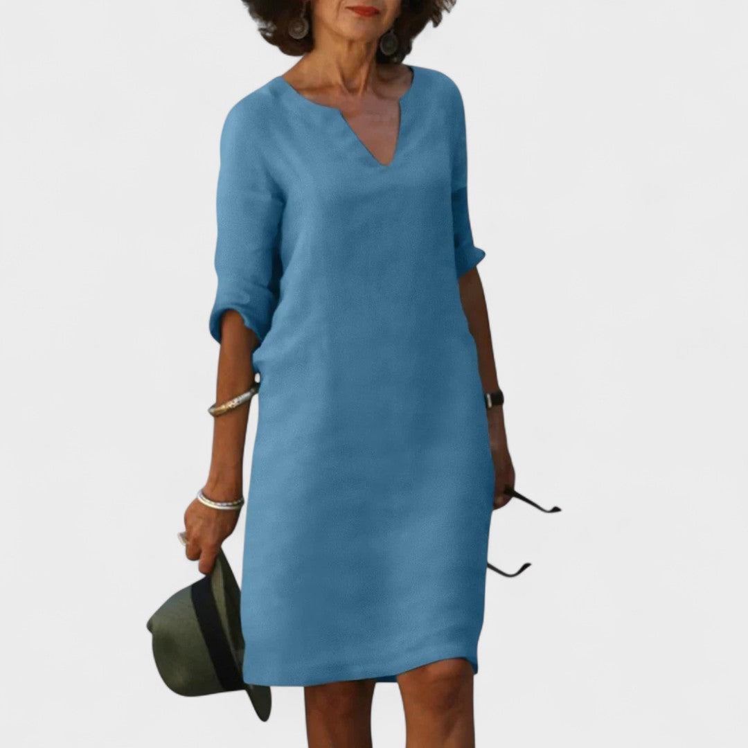 "Lana - Obleka z V-izrezom" could be rewritten as "Lana - V-Neck Dress".