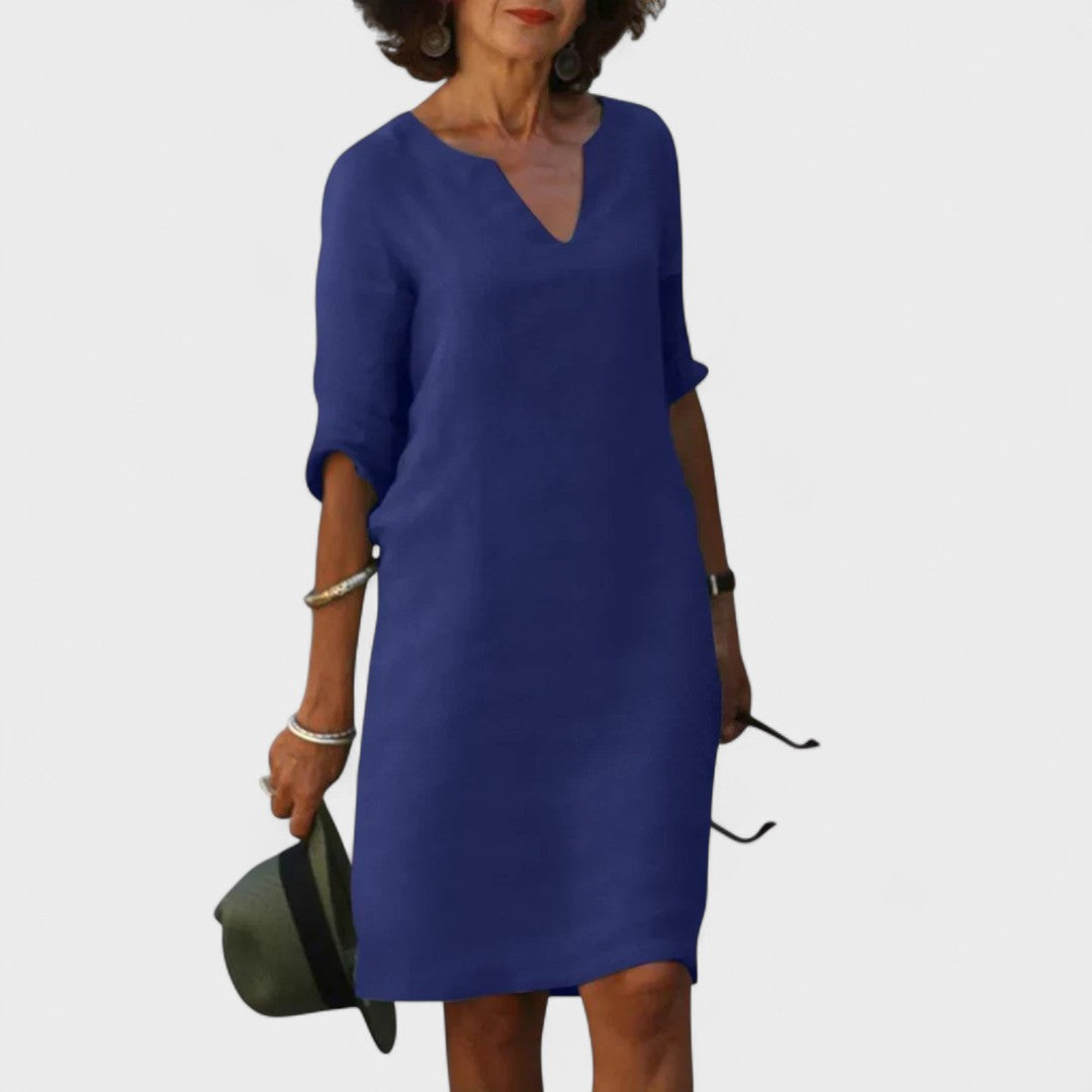 "Lana - Obleka z V-izrezom" could be rewritten as "Lana - V-Neck Dress".