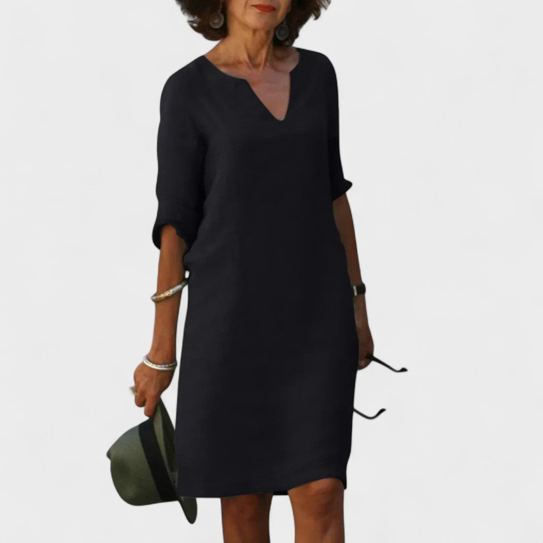 "Lana - Obleka z V-izrezom" could be rewritten as "Lana - V-Neck Dress".