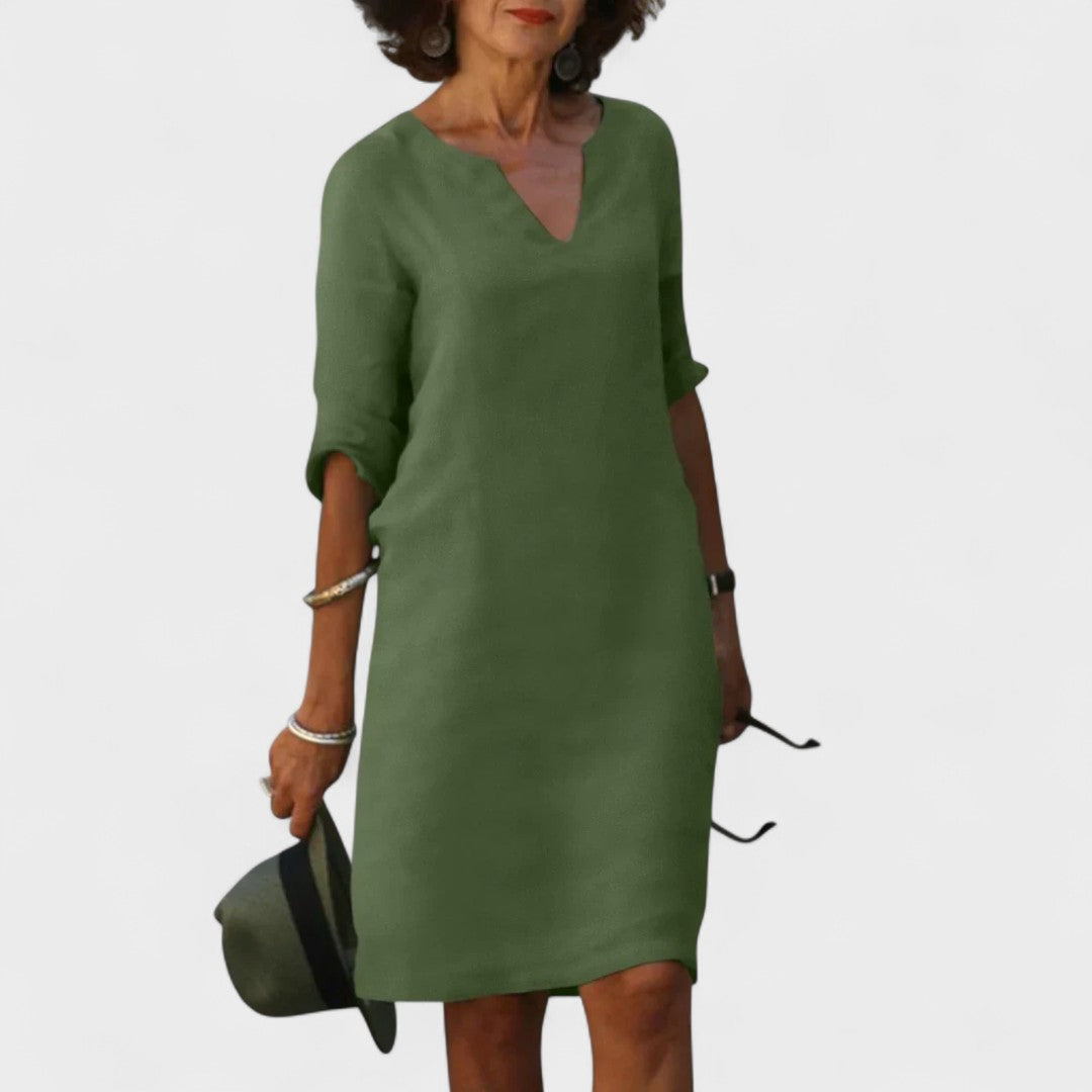 "Lana - Obleka z V-izrezom" could be rewritten as "Lana - V-Neck Dress".