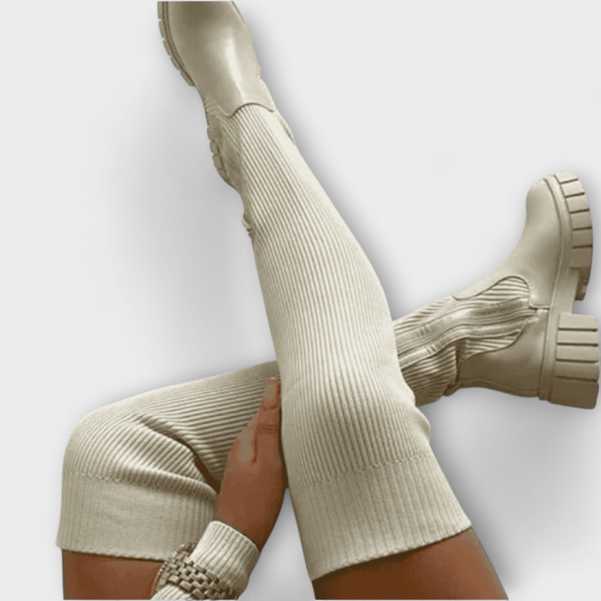 "Aušrinė - Čevlji do kolen" can be rewritten as "Aušrinė - Čevlji do kolen (Knee-High Boots)".