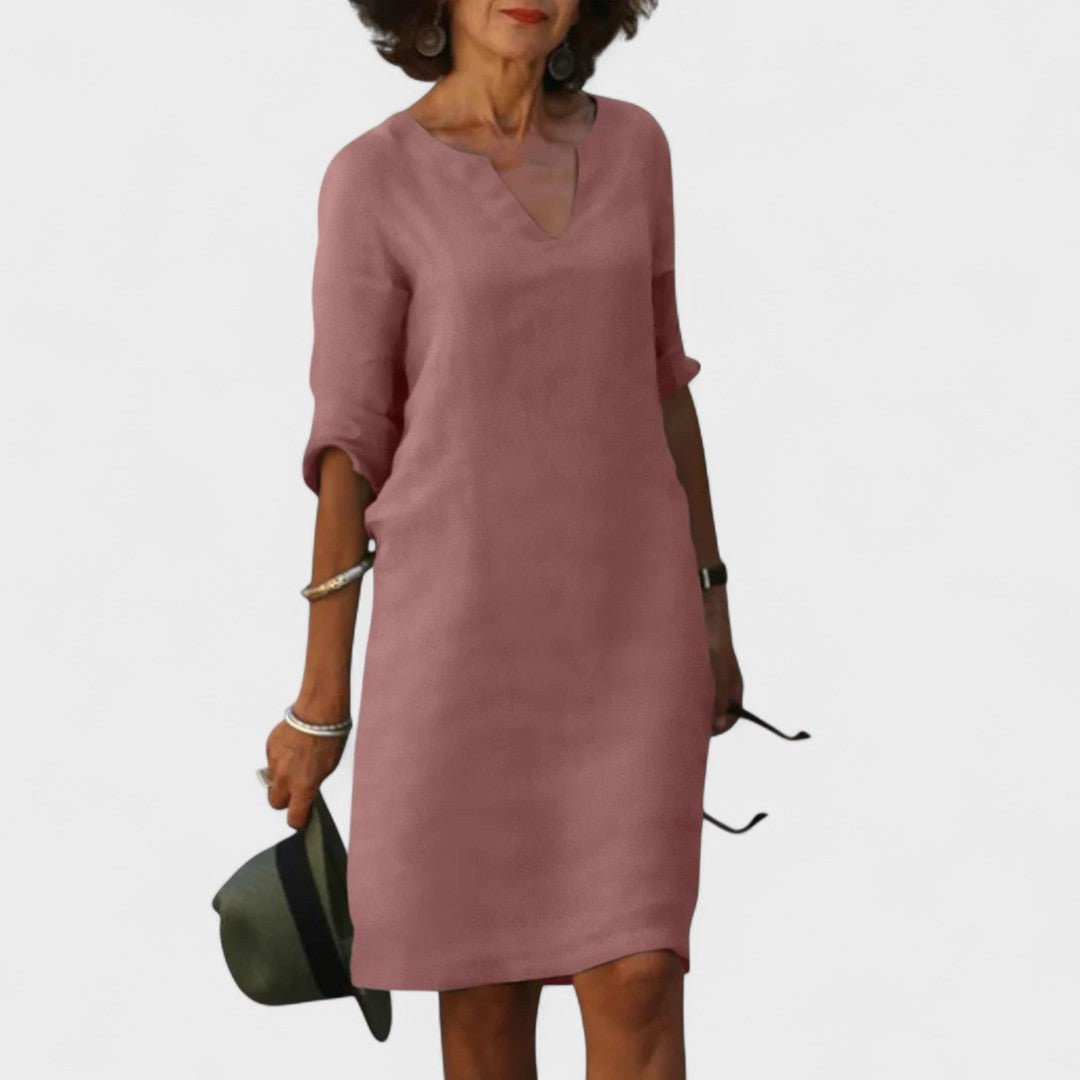 "Lana - Obleka z V-izrezom" could be rewritten as "Lana - V-Neck Dress".