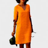 "Lana - Obleka z V-izrezom" could be rewritten as "Lana - V-Neck Dress".